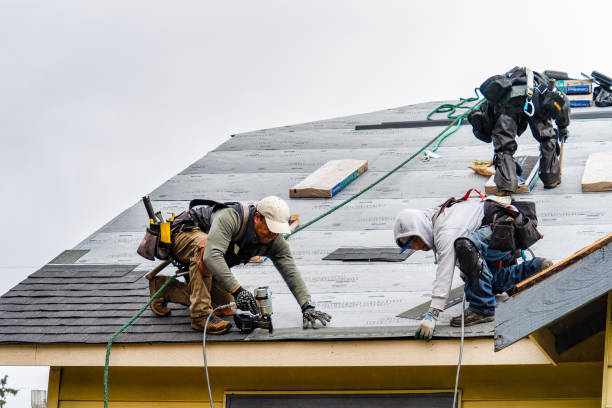 Professional Roofing technician working in Readville, MA